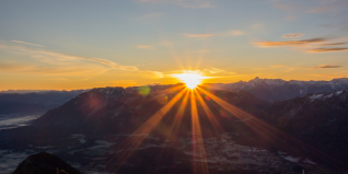 Sunrise over a mountain range, symbolizing vision, hope, and the power of purpose-driven leadership.